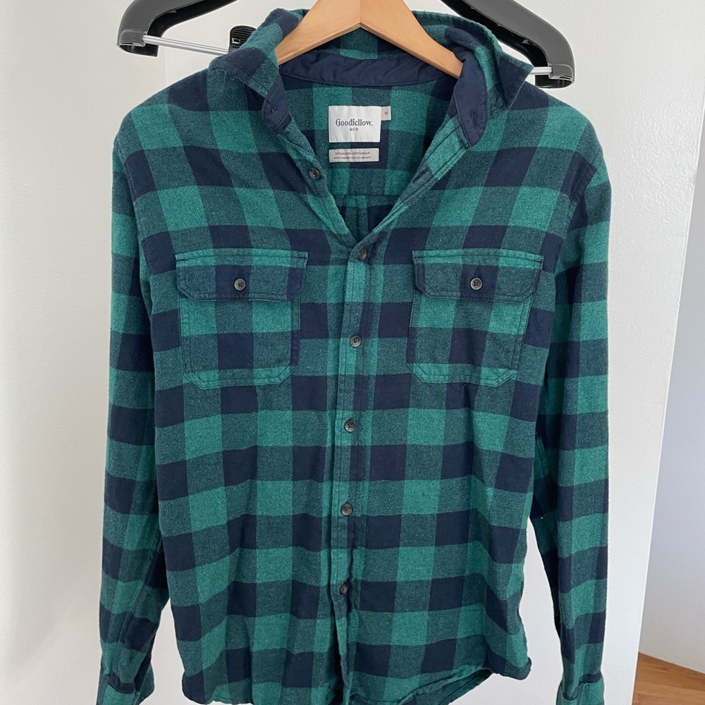 Two mens flannel shirts